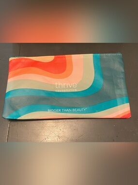 Thrive Causemetics Multicolor Wave Cosmetic Bag